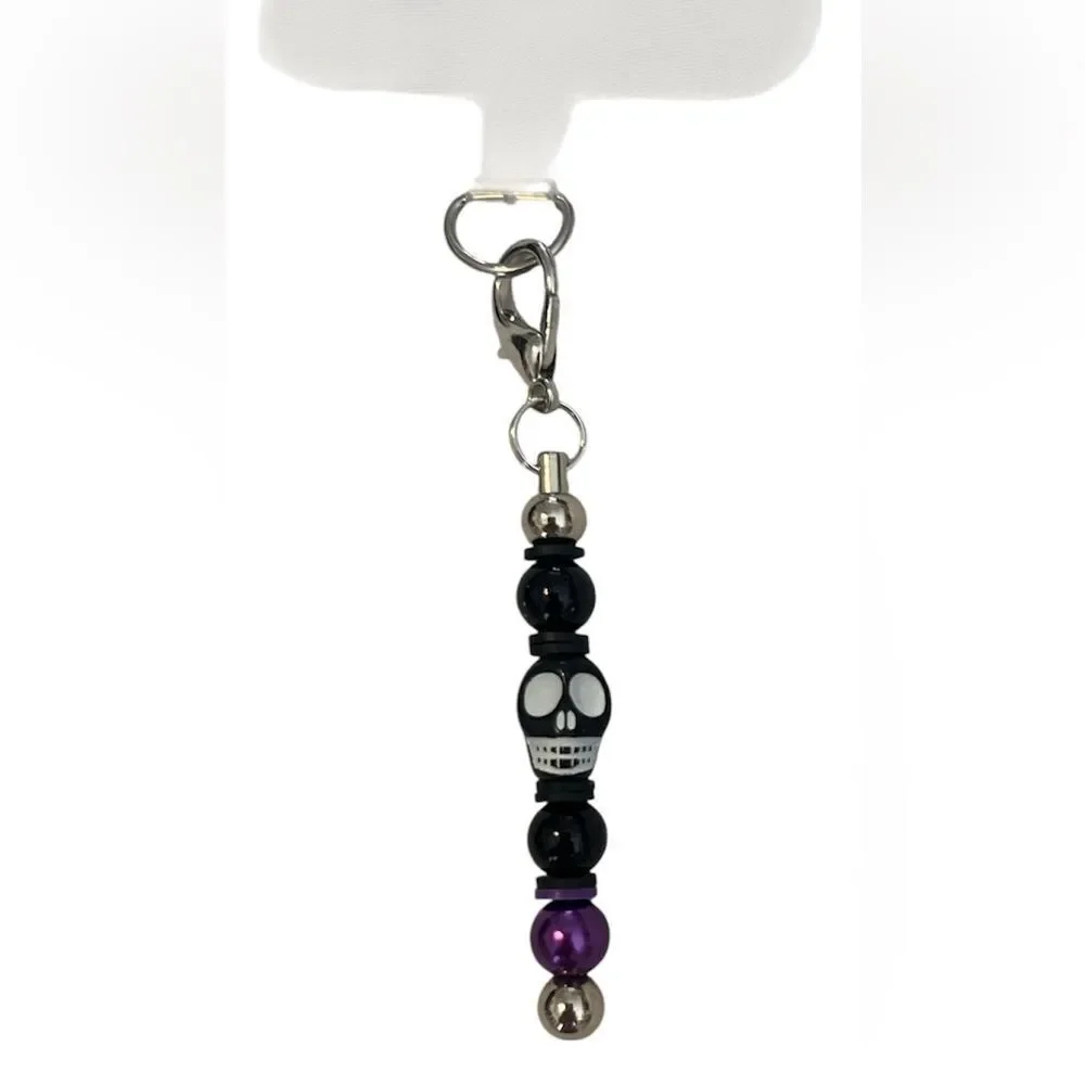 NWT one of a kind Angelas Designs black and purple skull cell phone charm